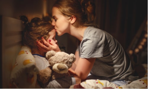 Mum and daughter in bed